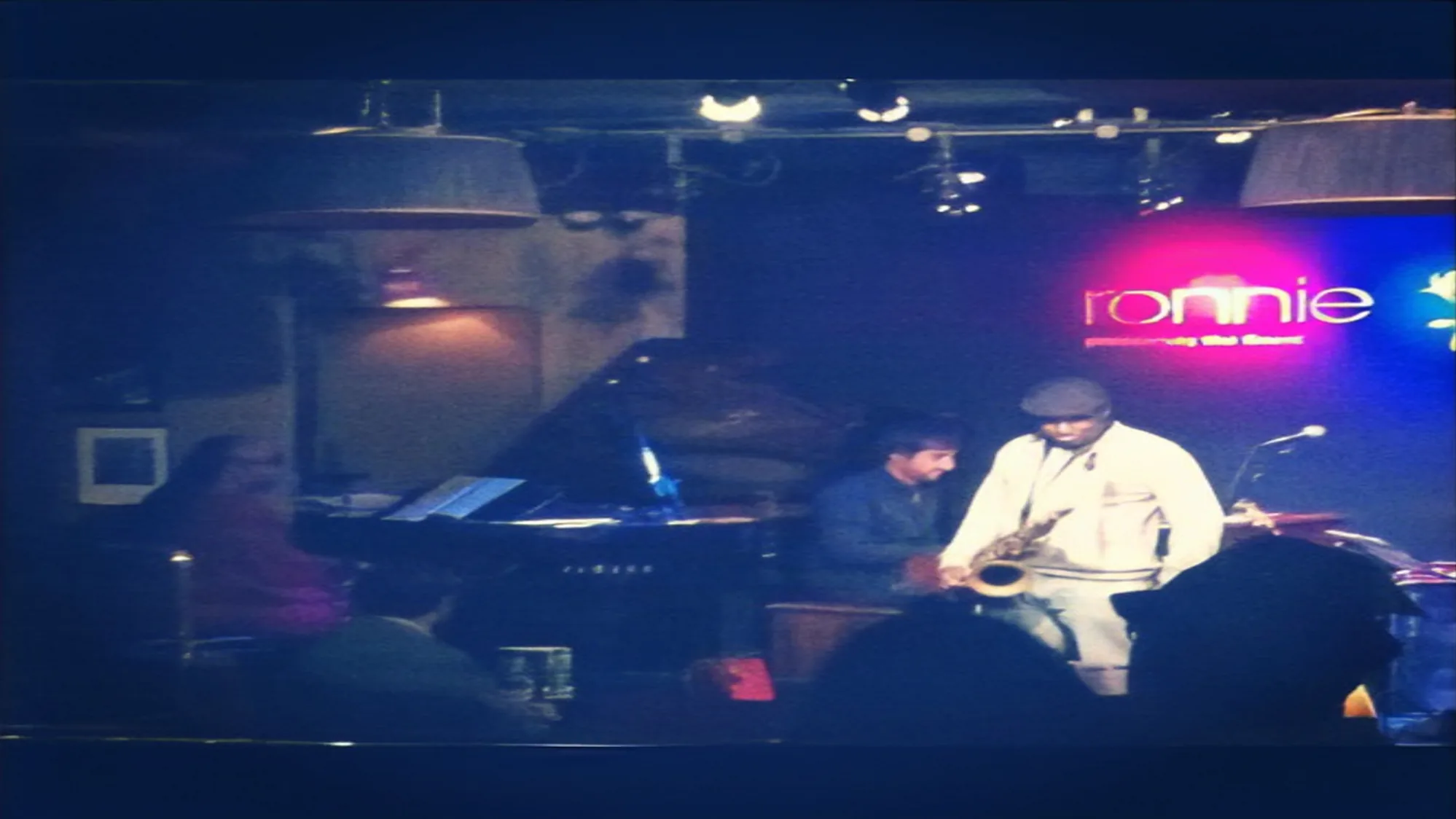 Richie Garrison on stage with Stevie Wonder