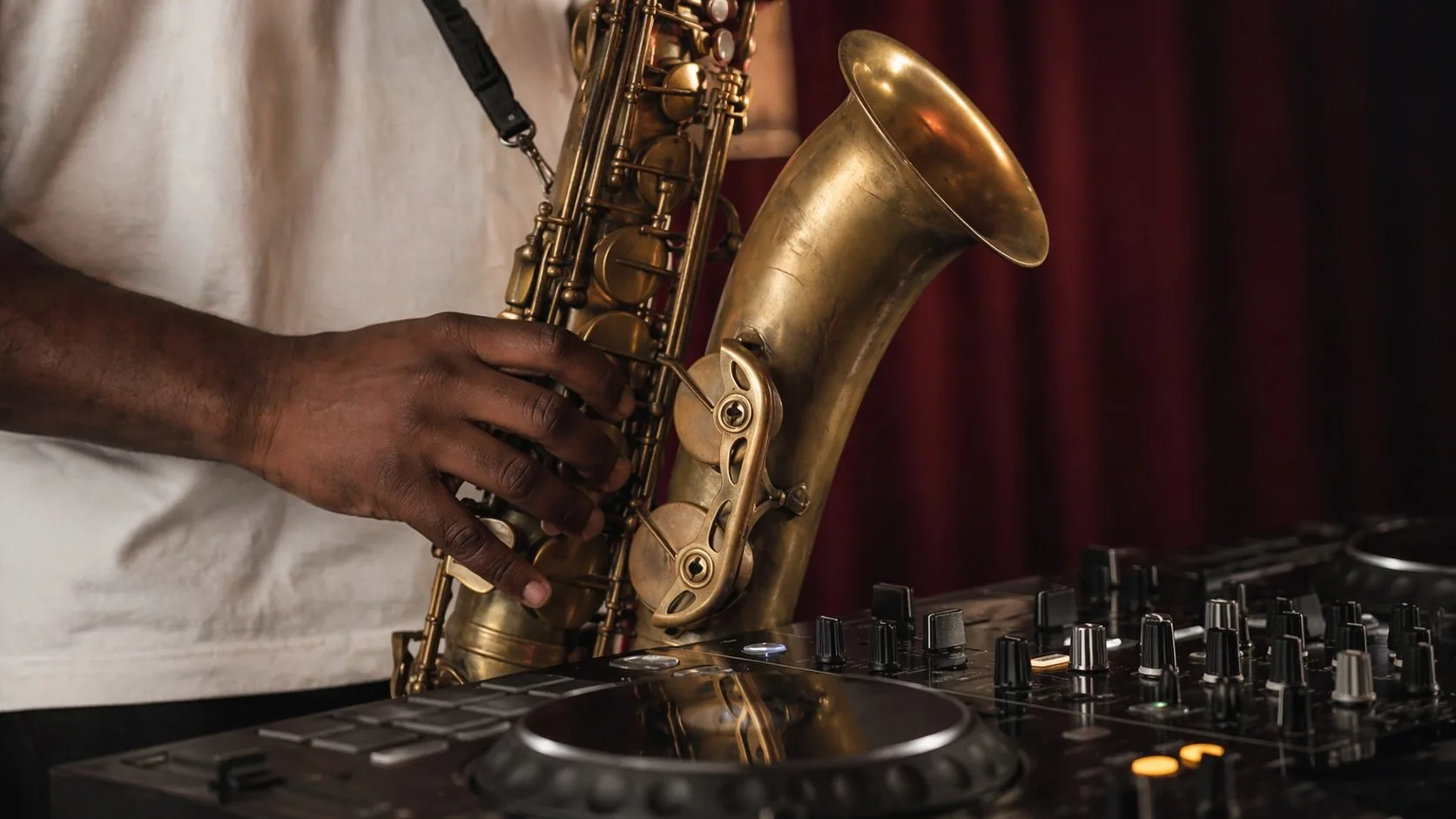 Richie Garrison — saxophone and DJ mixer close-up