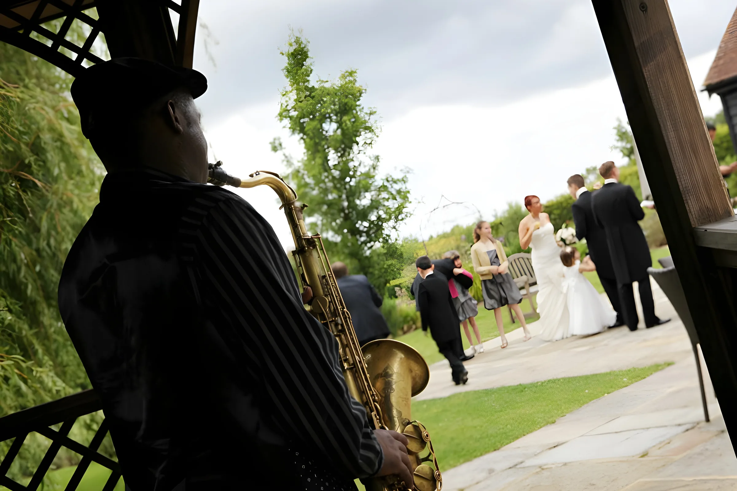 Richie Garrison performing saxophone at a wedding