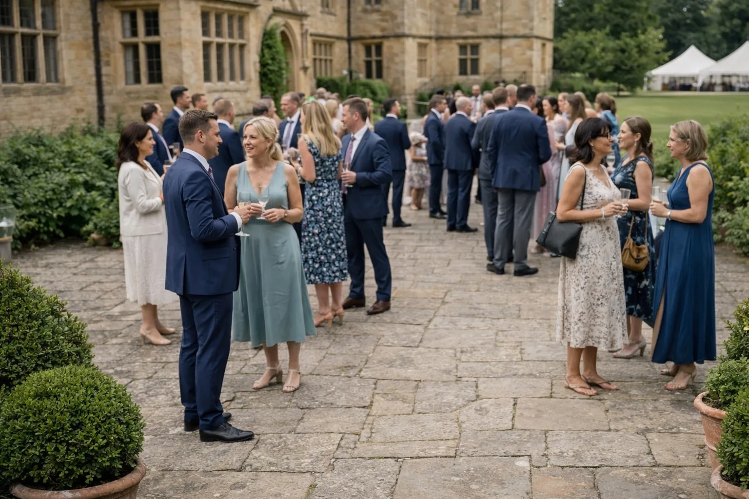 Guests at an elegant outdoor wedding venue